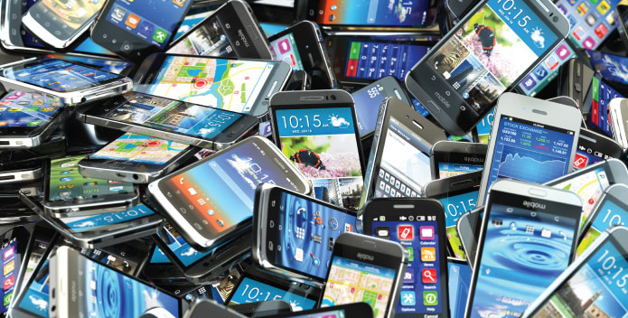 E-Waste - a pile of discarded smartphones