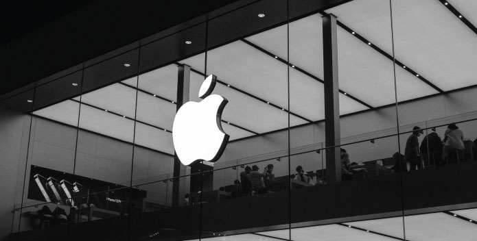 Silver Apple logo on glass office or shop facia